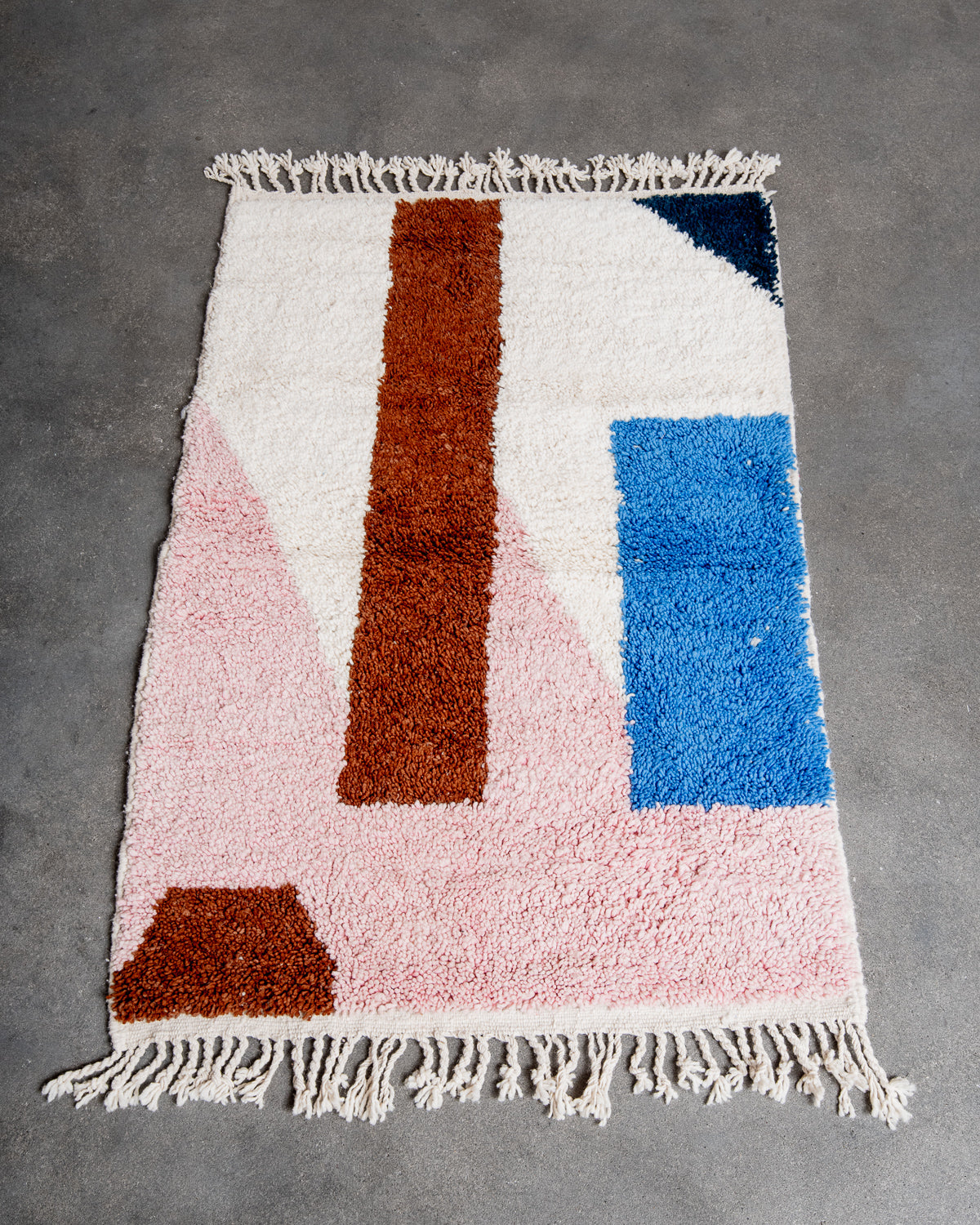 Modern, designer, handcrafted Berber rug from Morocco. Beniourain carpet with beautiful colours and patterns and fluffy wool texture.